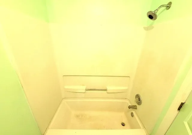 a bathroom with a bathtub