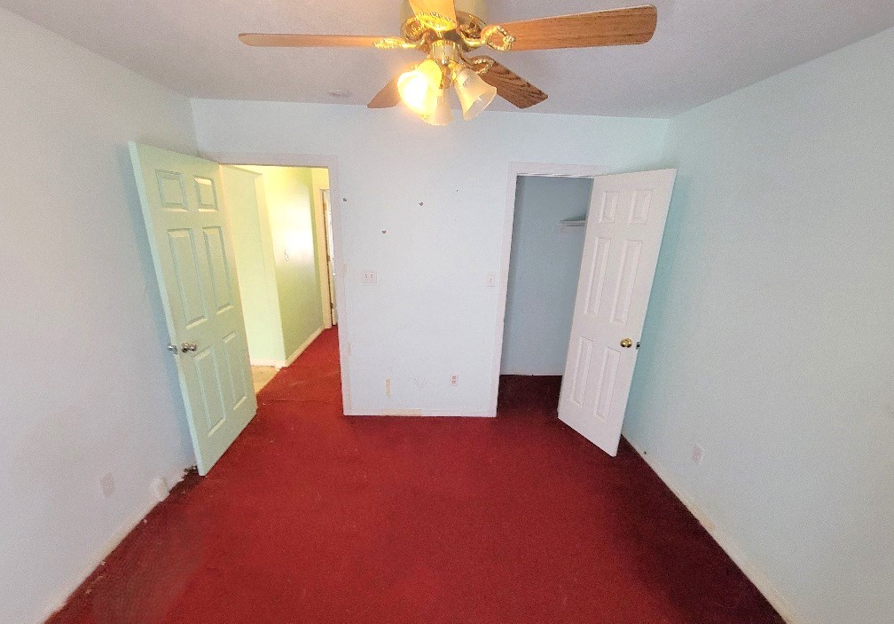 1801 Coe Road Pinehurst, TX 77362 - Photo 16 of 26 a view of an empty room with a window