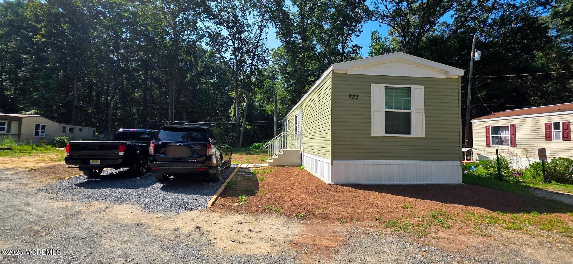 254 Lakewood Road New Egypt, NJ 08533 - Photo 4 of 18 a car parked in front of a house