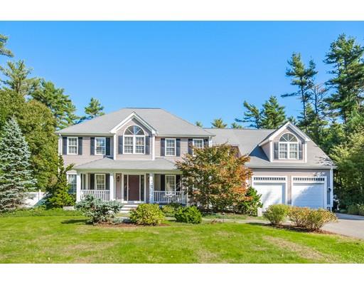 12 Benson Road Rochester, MA 02770 - Photo 1 of 28 a front view of a house with a yard