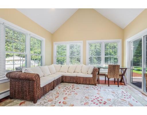 12 Benson Road Rochester, MA 02770 - Photo 12 of 28 a living room with furniture and large windows