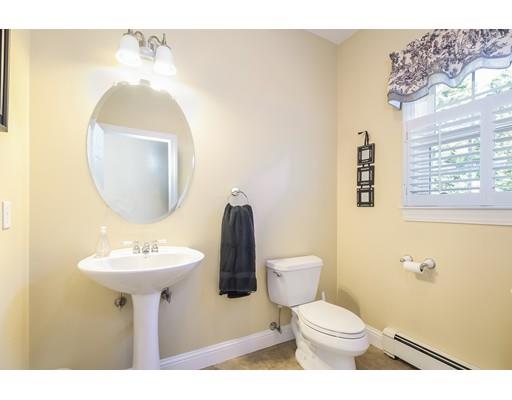 12 Benson Road Rochester, MA 02770 - Photo 13 of 28 a bathroom with a toilet sink and mirror