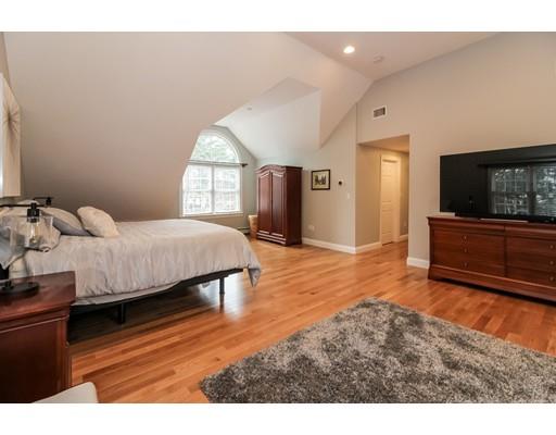 12 Benson Road Rochester, MA 02770 - Photo 15 of 28 a bedroom with a bed window and a television