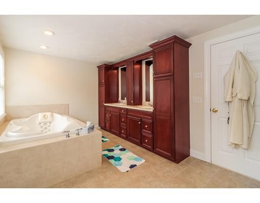 12 Benson Road Rochester, MA 02770 - Photo 16 of 28 a kitchen with a refrigerator and cabinet