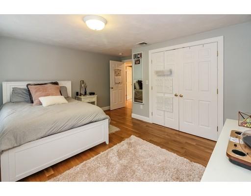 12 Benson Road Rochester, MA 02770 - Photo 17 of 28 a spacious bedroom with a bed and a view of bathroom