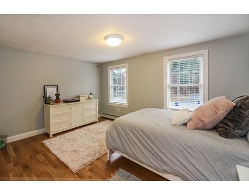 12 Benson Road Rochester, MA 02770 - Photo 18 of 28 a bedroom with a bed and a window