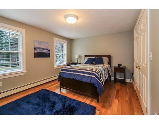 12 Benson Road Rochester, MA 02770 - Photo 20 of 28 a bedroom with a bed and a window