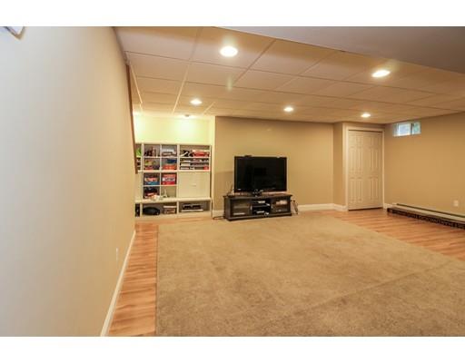 12 Benson Road Rochester, MA 02770 - Photo 21 of 28 a view of a livingroom with a flat screen tv