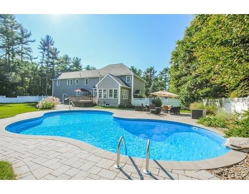 12 Benson Road Rochester, MA 02770 - Photo 24 of 28 a swimming pool with outdoor seating and yard