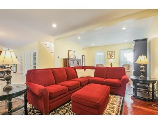12 Benson Road Rochester, MA 02770 - Photo 4 of 28 a living room with furniture and a lamp