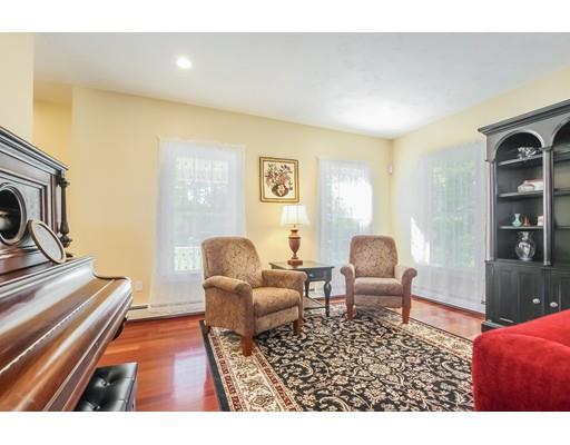 12 Benson Road Rochester, MA 02770 - Photo 5 of 28 a living room with furniture and a fireplace