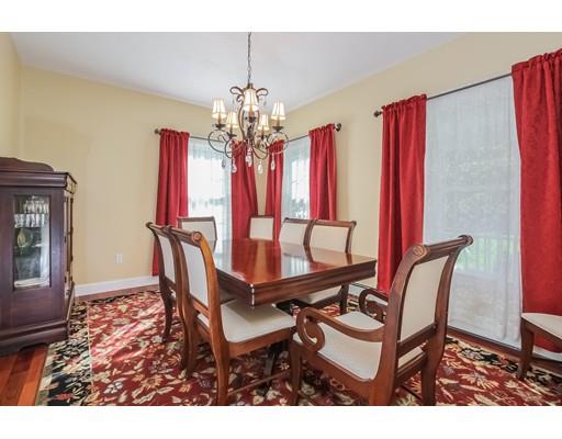 12 Benson Road Rochester, MA 02770 - Photo 6 of 28 a view of a dining room with furniture and chandelier