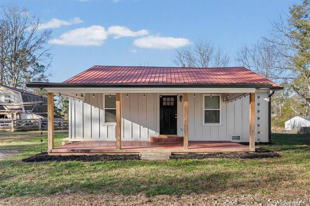 a view of a house with a garden