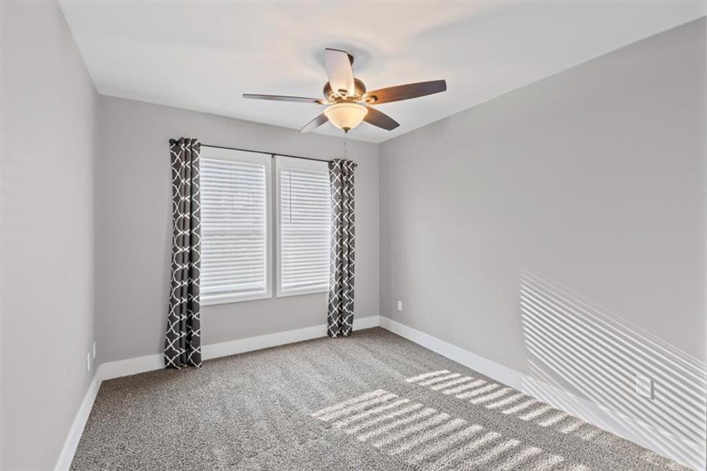 18 Farmer Road Northwest Cartersville, GA 30120 - Photo 18 of 33 wooden floor in an empty room with a window