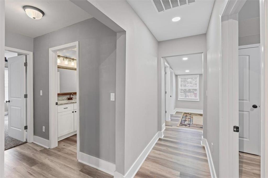 18 Farmer Road Northwest Cartersville, GA 30120 - Photo 19 of 33 wooden floor with a bedroom