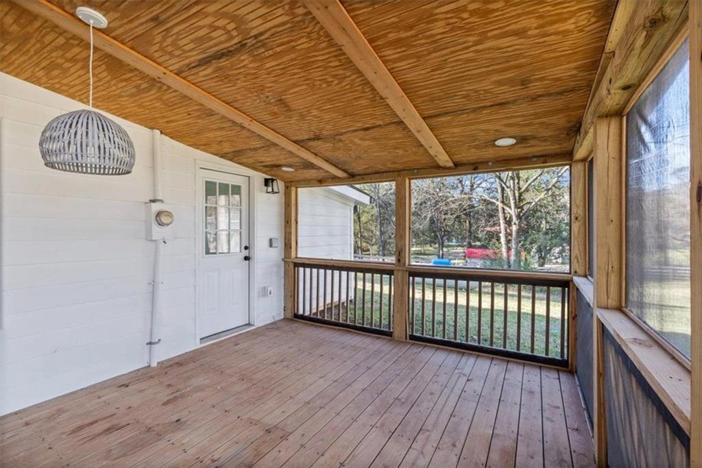 18 Farmer Road Northwest Cartersville, GA 30120 - Photo 24 of 33 a view of a porch with wooden floor