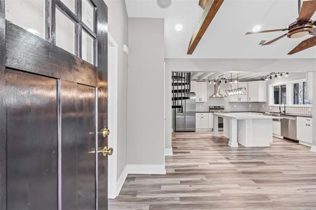 18 Farmer Road Northwest Cartersville, GA 30120 - Photo 6 of 33 a view of a kitchen with cabinets and wooden floor