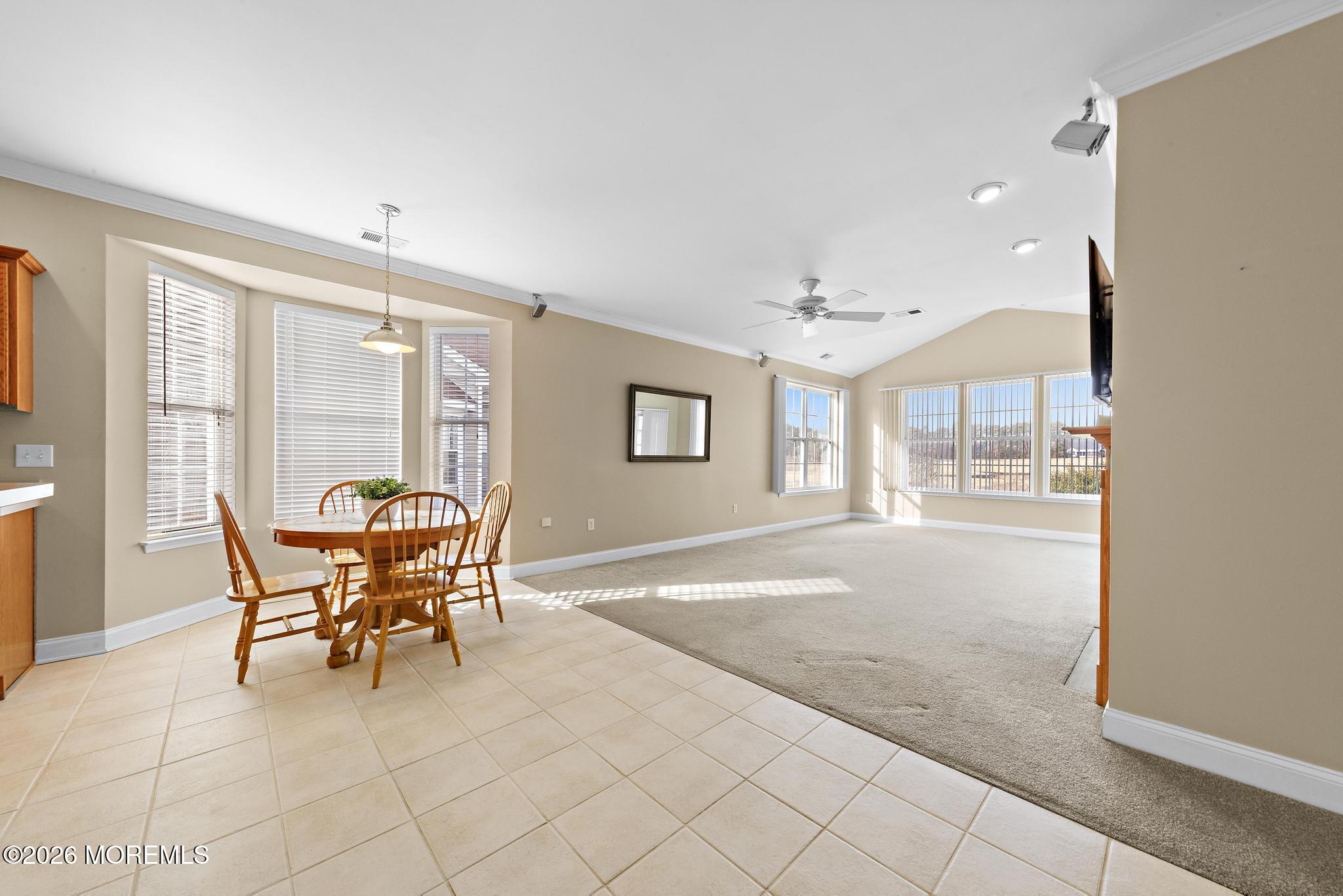 407 Golf View Drive Little Egg Harbor, NJ 08087 - Photo 14 of 58 a dining room with furniture and wooden floor