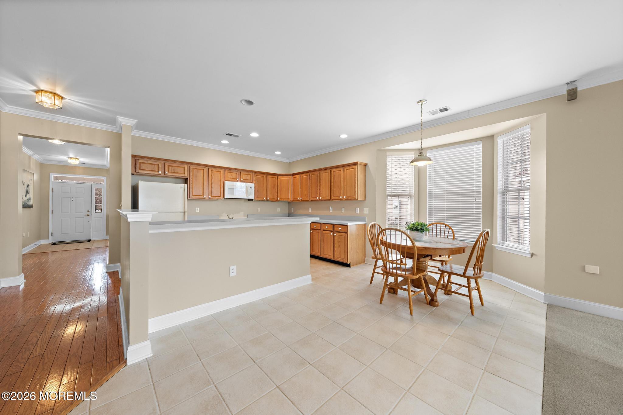 407 Golf View Drive Little Egg Harbor, NJ 08087 - Photo 15 of 58 a view of a dining room with furniture window and outside view
