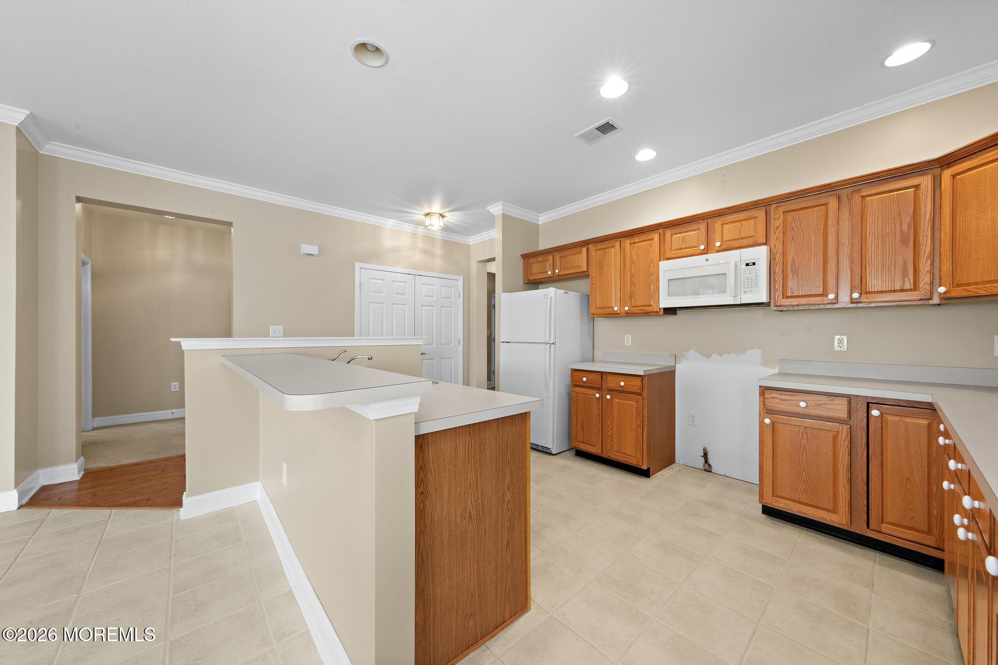 407 Golf View Drive Little Egg Harbor, NJ 08087 - Photo 19 of 58 a view of kitchen with stainless steel appliances granite countertop cabinets and sink