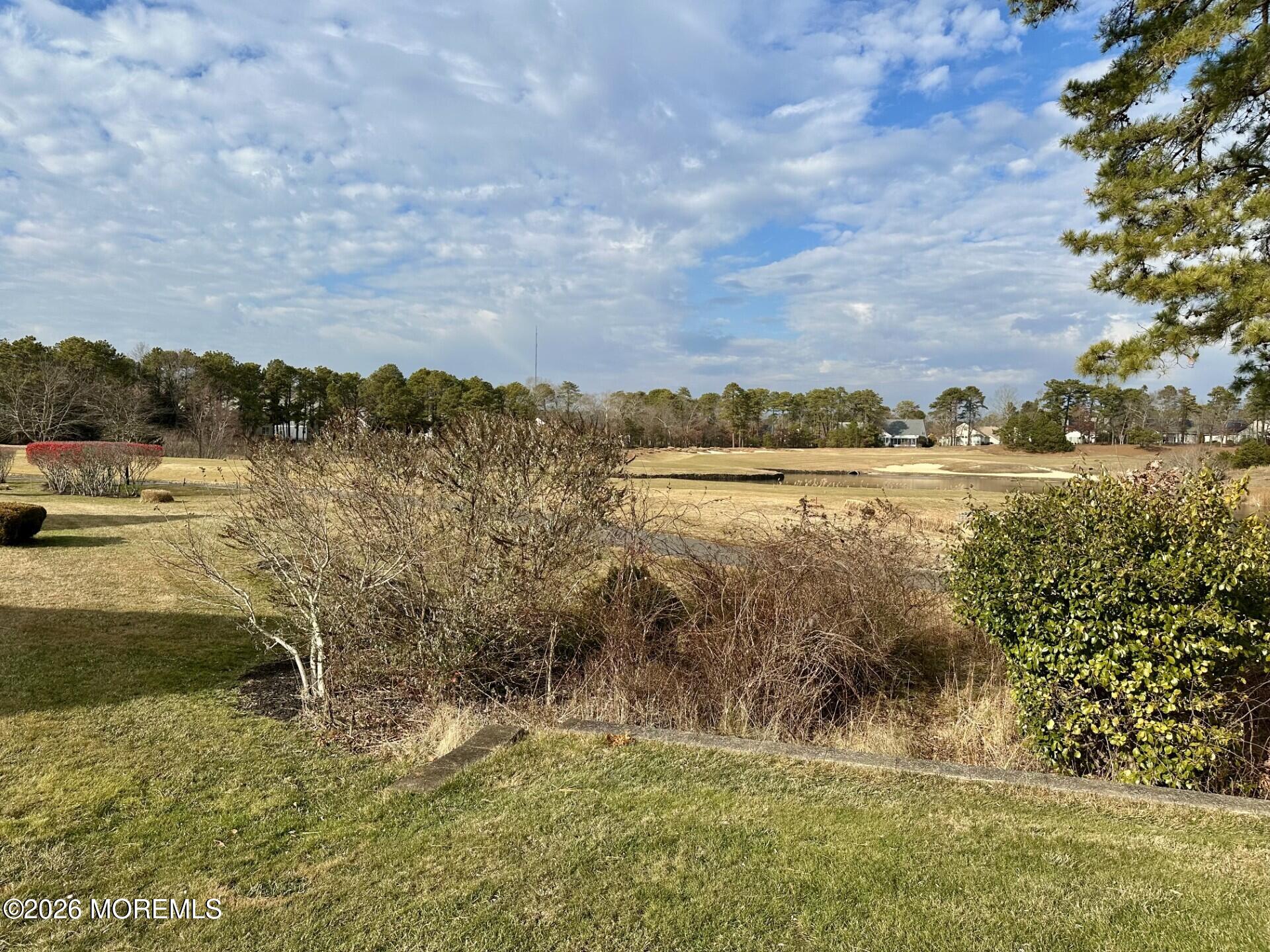 407 Golf View Drive Little Egg Harbor, NJ 08087 - Photo 2 of 58 a view of lake with mountain