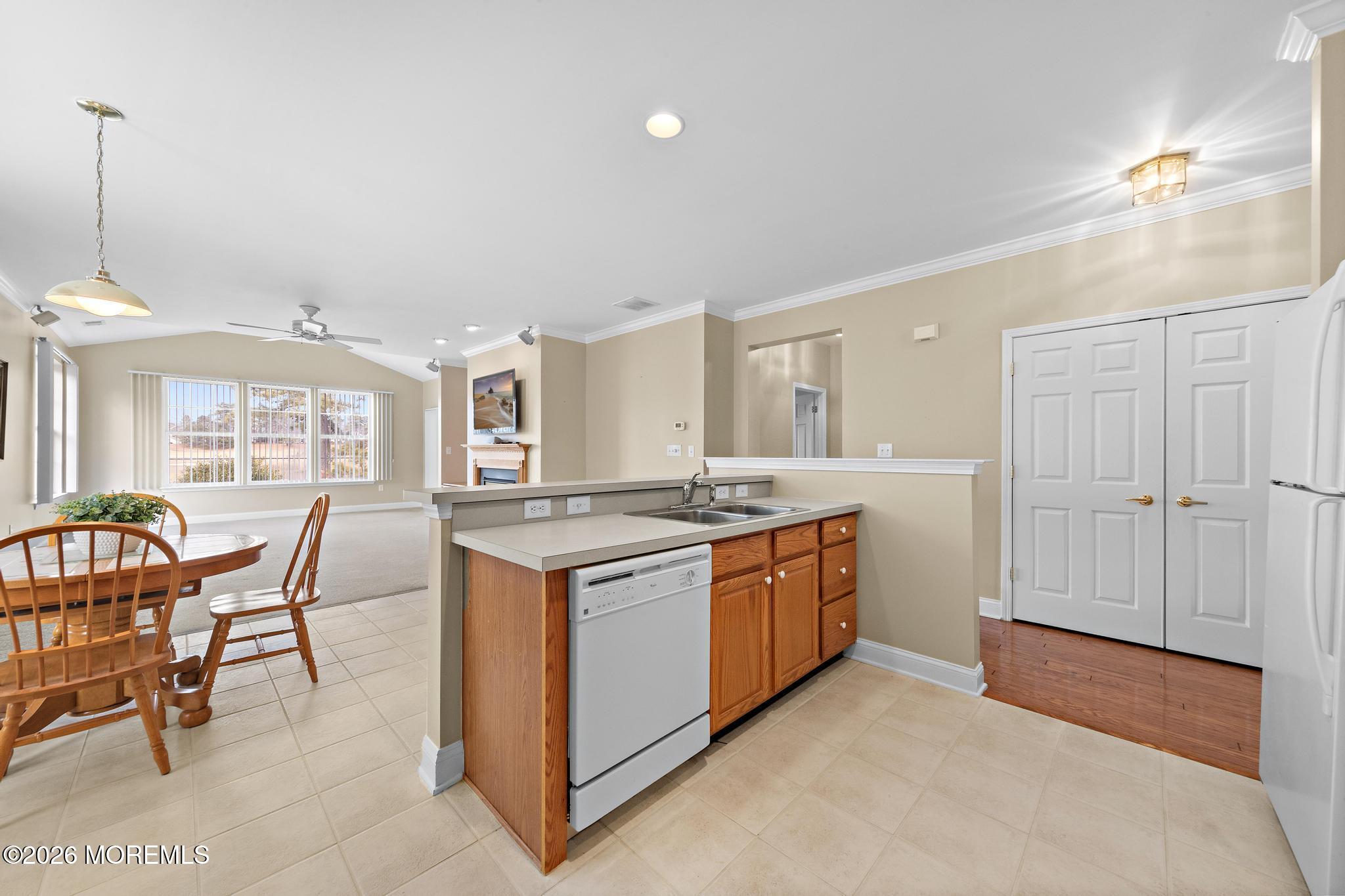 407 Golf View Drive Little Egg Harbor, NJ 08087 - Photo 21 of 58 a kitchen with stainless steel appliances granite countertop a stove and a wooden floors