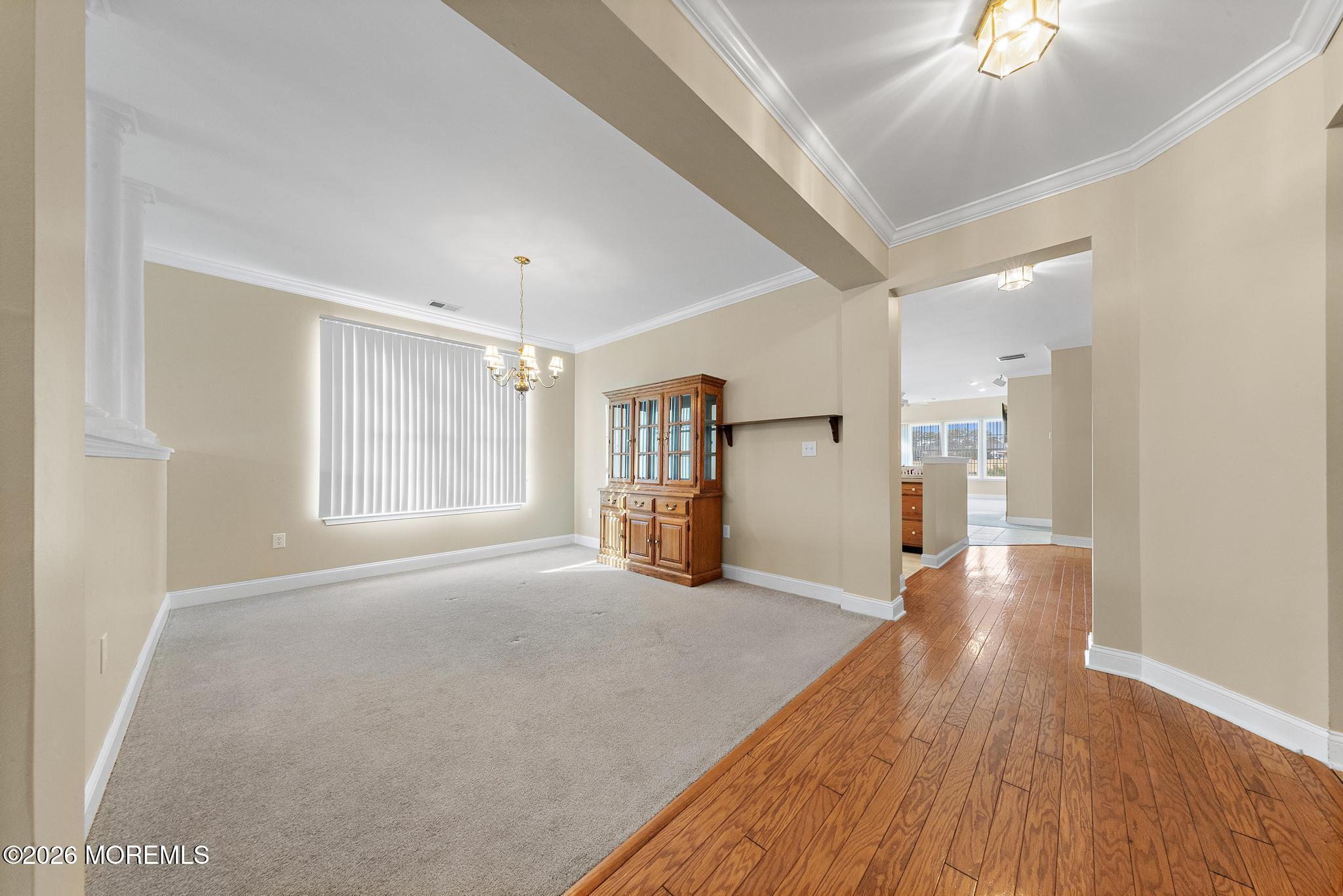 407 Golf View Drive Little Egg Harbor, NJ 08087 - Photo 29 of 58 a view of empty room with wooden floor and fan