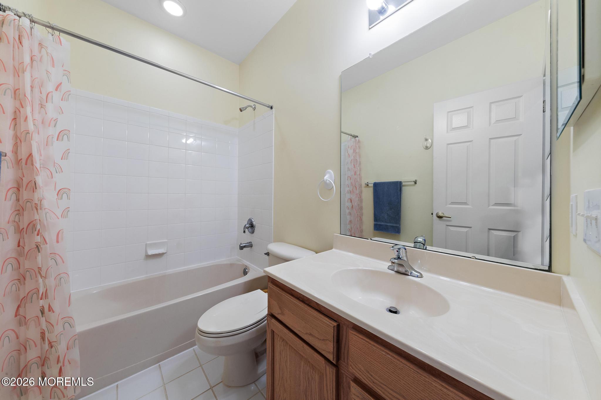 407 Golf View Drive Little Egg Harbor, NJ 08087 - Photo 36 of 58 a bathroom with a sink a toilet and shower
