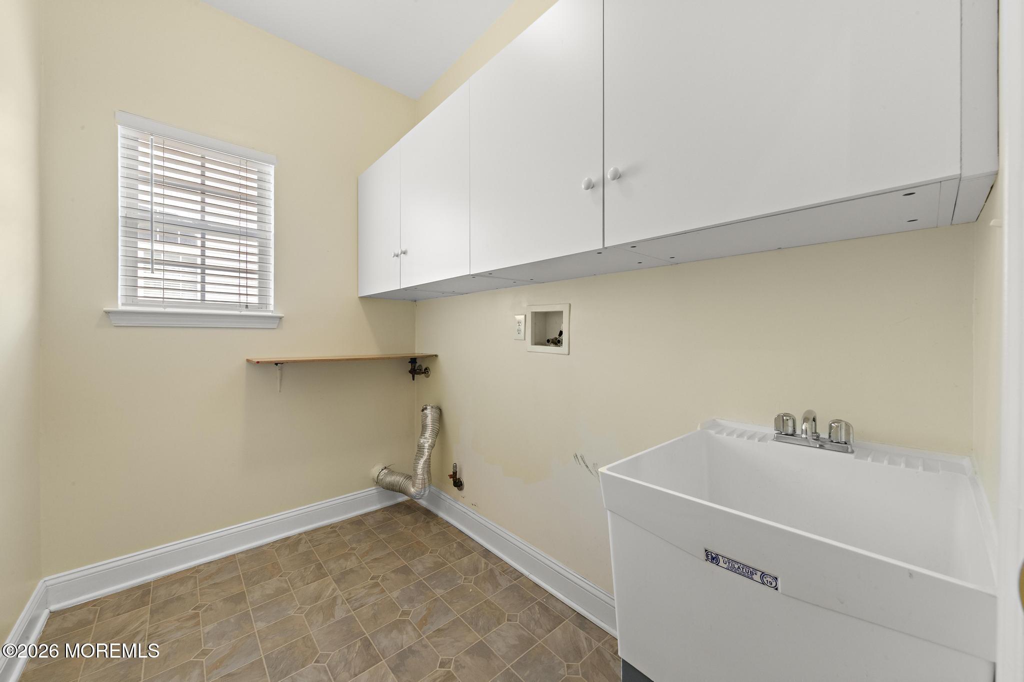 407 Golf View Drive Little Egg Harbor, NJ 08087 - Photo 37 of 58 a view of utility room with a window