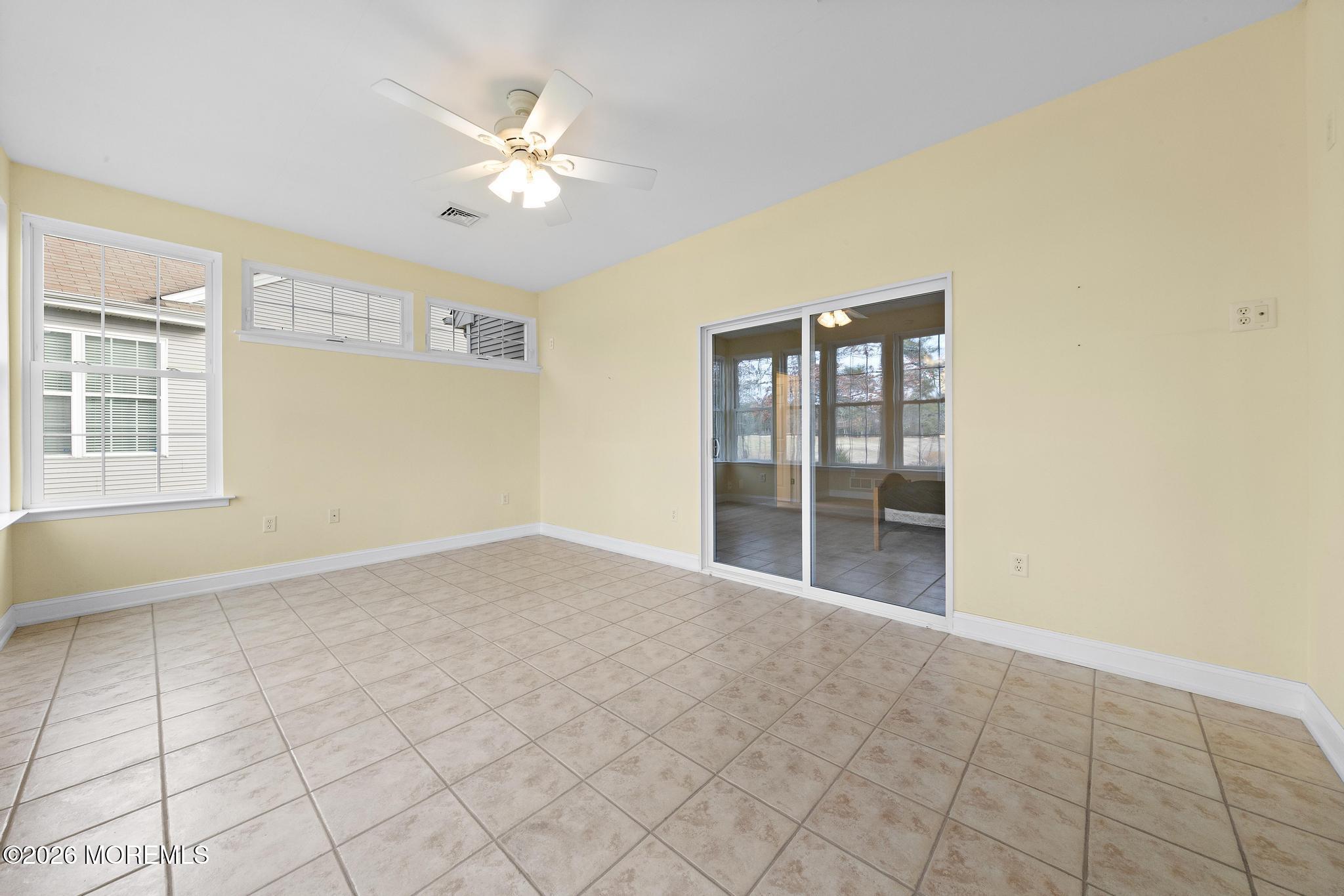 407 Golf View Drive Little Egg Harbor, NJ 08087 - Photo 39 of 58 a view of an empty room with a window