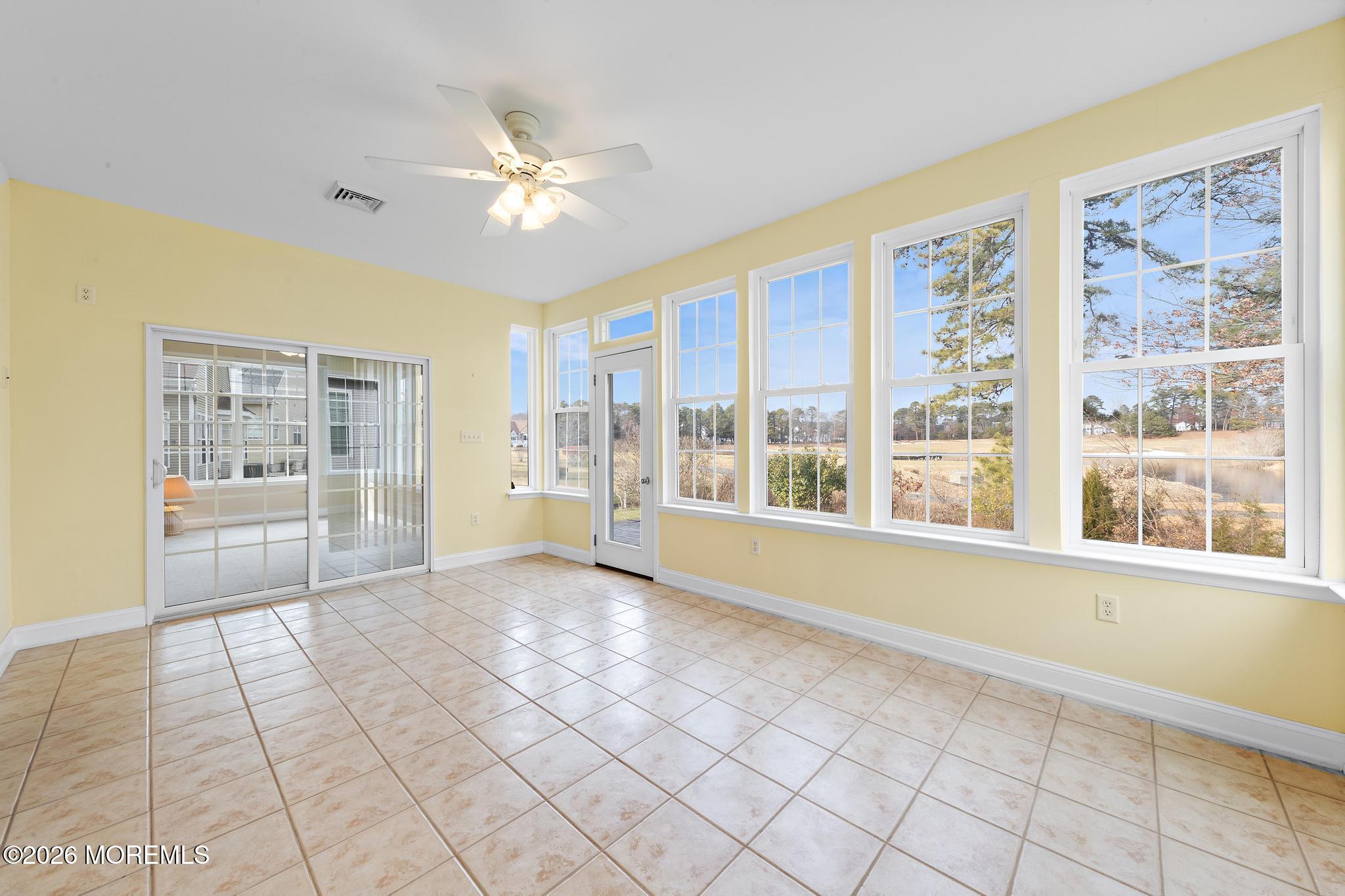 407 Golf View Drive Little Egg Harbor, NJ 08087 - Photo 41 of 58 a view of an empty room with a window