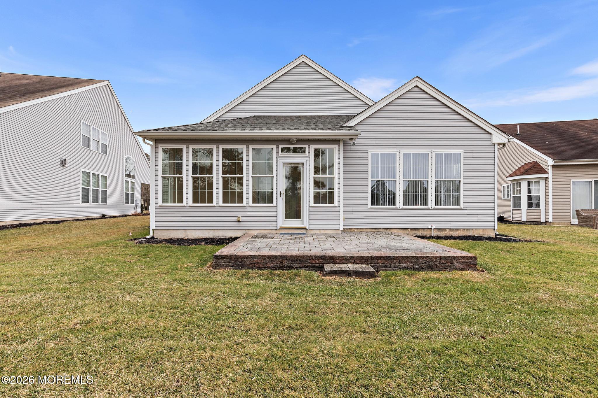 407 Golf View Drive Little Egg Harbor, NJ 08087 - Photo 52 of 58 a front view of a house with a yard