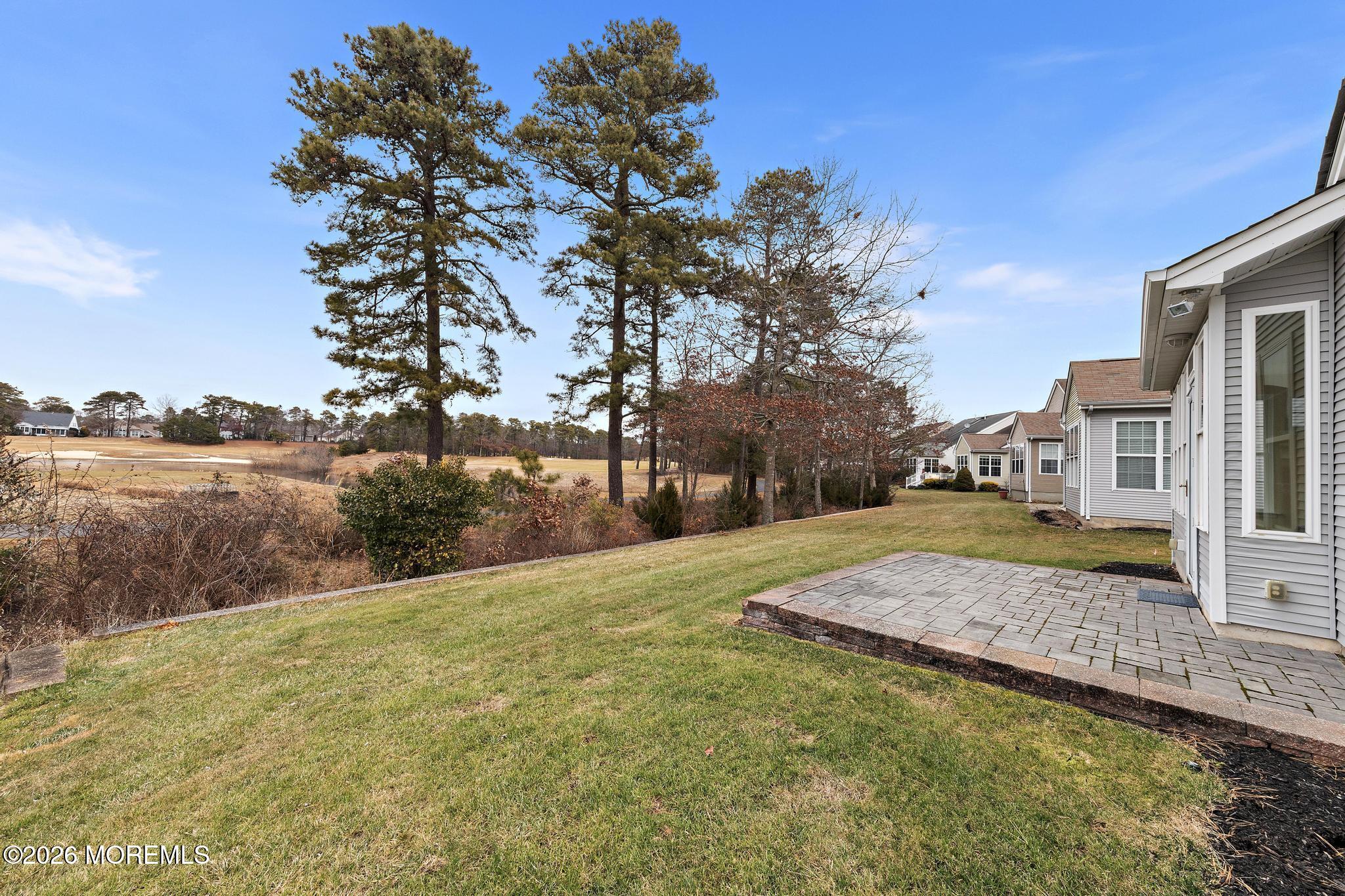 407 Golf View Drive Little Egg Harbor, NJ 08087 - Photo 53 of 58 a view of a house with pool and a yard