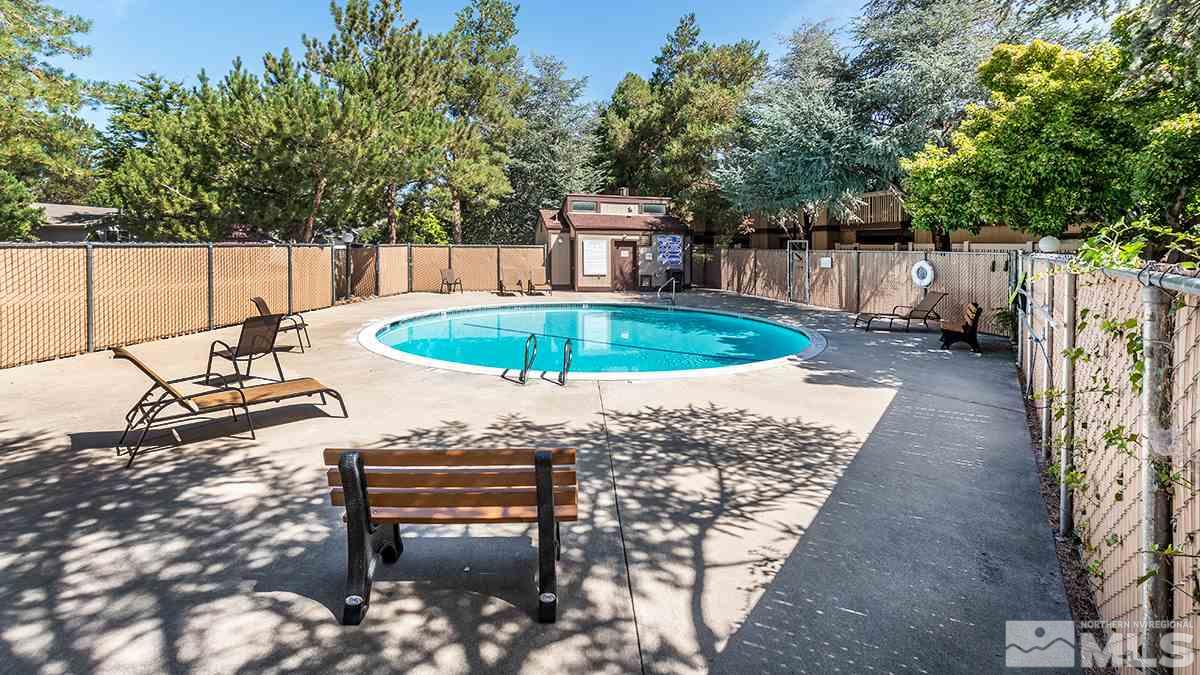 4544 Matich Drive Reno, NV 89502 - Photo 13 of 19 a view of a backyard with a patio and outdoor seating