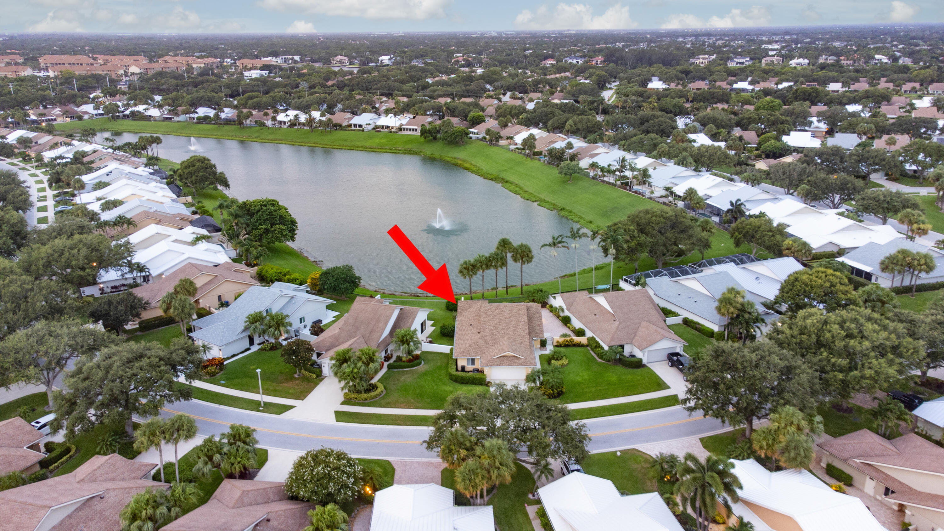 114 Beach Summit Court Jupiter, FL 33477 - Photo 86 of 97 an aerial view of residential houses with outdoor space and lake view