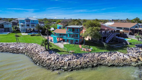 a view of a lake with a building in the background