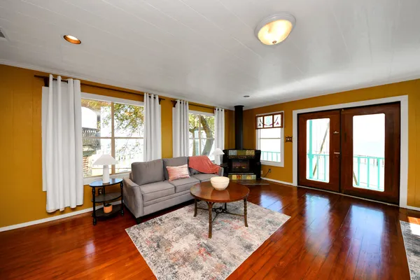 a bed room with a bed and a large mirror