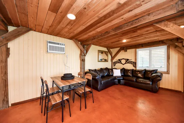 a view of a chairs and tables in patio
