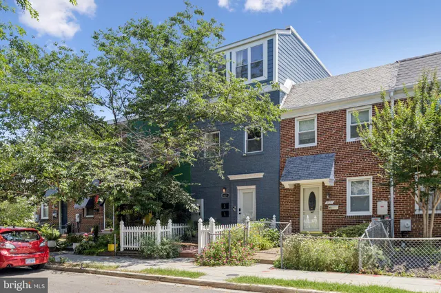front view of a house with a street