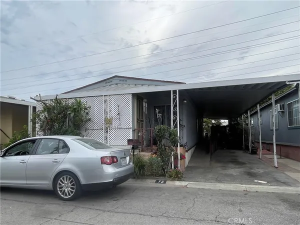 a front view of a house with garage