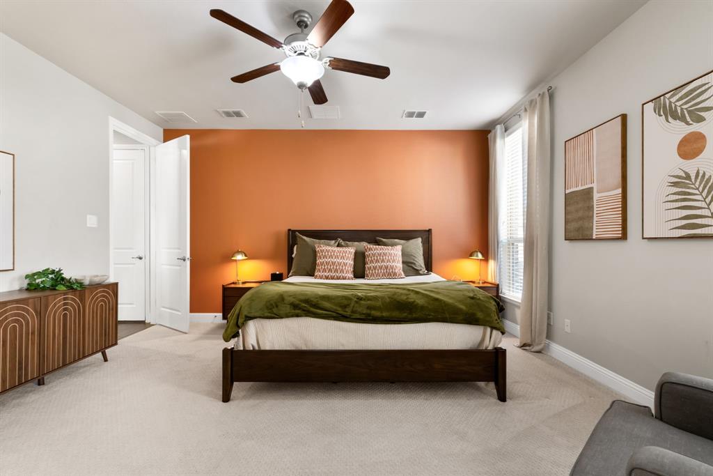 6309 Hall Road Frisco, TX 75034 - Photo 14 of 35 Primary Bedroom with carpet flooring and a ceiling fan