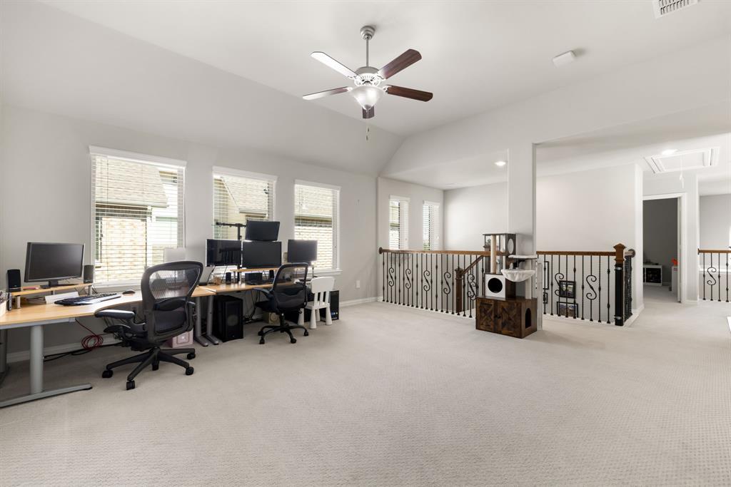 6309 Hall Road Frisco, TX 75034 - Photo 18 of 35 Home office with attic access, carpet flooring, a ceiling fan, and lofted ceiling