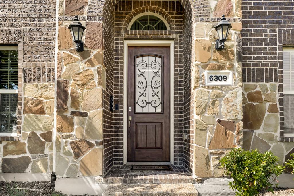 6309 Hall Road Frisco, TX 75034 - Photo 2 of 35 Property entrance featuring brick siding