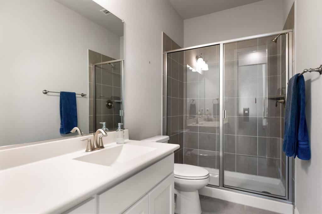 6309 Hall Road Frisco, TX 75034 - Photo 24 of 35 Full bath with vanity and a shower stall