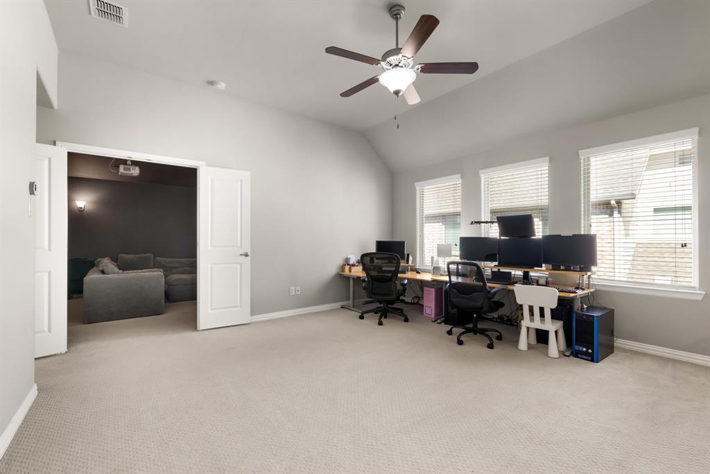 6309 Hall Road Frisco, TX 75034 - Photo 28 of 35 Office area featuring light carpet, ceiling fan, and vaulted ceiling