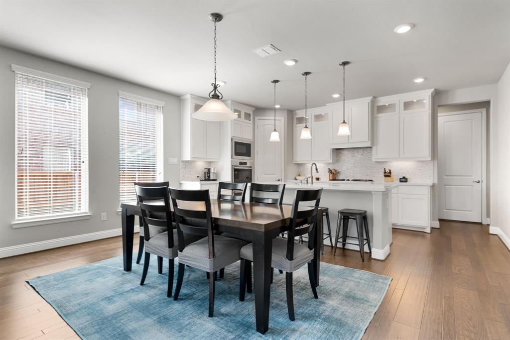 6309 Hall Road Frisco, TX 75034 - Photo 10 of 35 Dining room featuring dark wood finished floors and recessed lighting