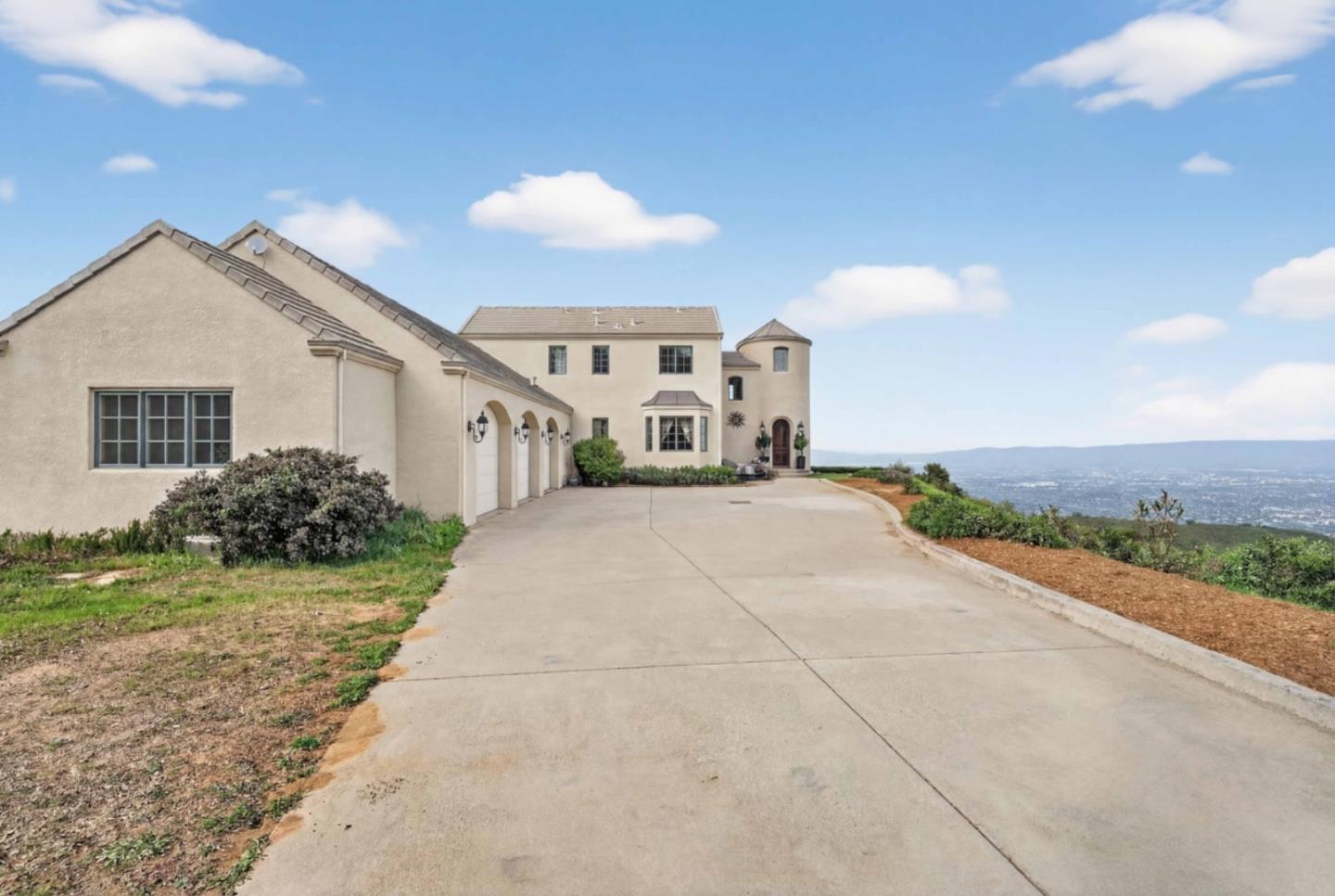 17599 Montebello Road Cupertino, CA 95014 - Photo 2 of 83 a view of a house with a yard