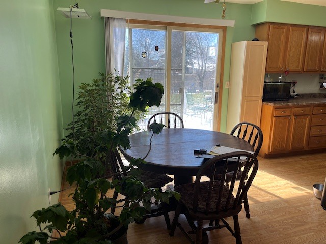 24314 South Burr Road Channahon, IL 60410 - Photo 11 of 17 a view of a dining room with furniture and chandelier