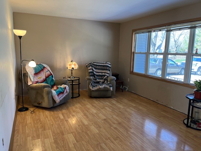 24314 South Burr Road Channahon, IL 60410 - Photo 5 of 17 a living room with furniture hard wood floor and a large window
