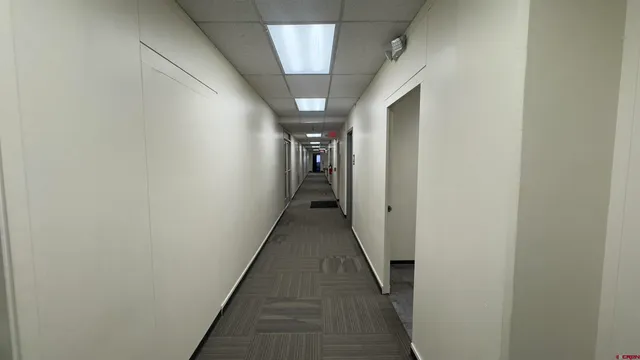 a view of a livingroom with furniture